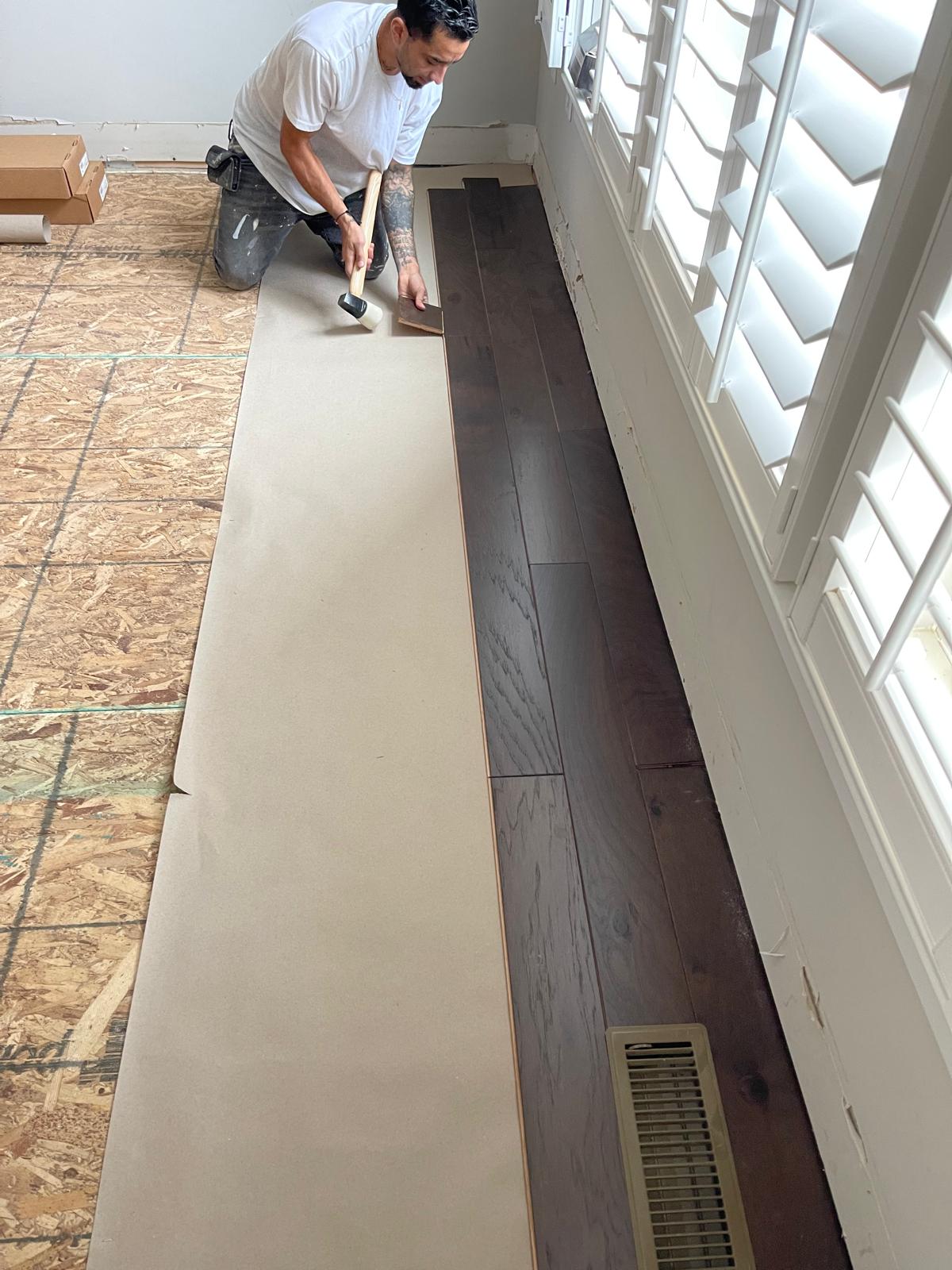 Hardwood flooring being installed